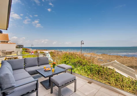 The patio & outdoor sitting area at Westward Home!, Westward Ho!