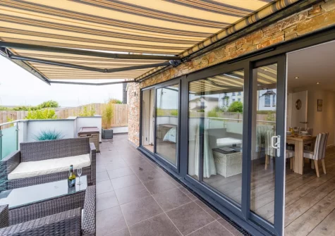 The terrace & outdoor sitting area at Westward Pebbleridge, Westward Ho!