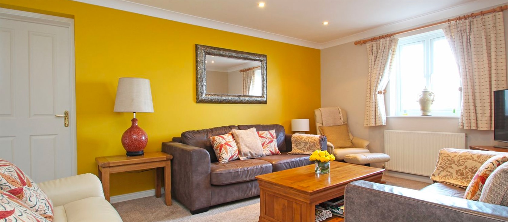 Wheal Kendall, a three-story holiday cottage set into the hillside overlooking pretty Mevagissey harbour. Five bedrooms & three bathrooms accommodate up to ten with well-equipped kitchen, large sitting room, off-road parking & three balconies with amazing sea views!