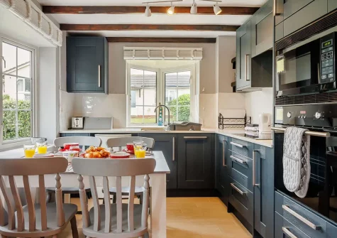 The kitchen & dining area at White Cloud Cottage, Brixham