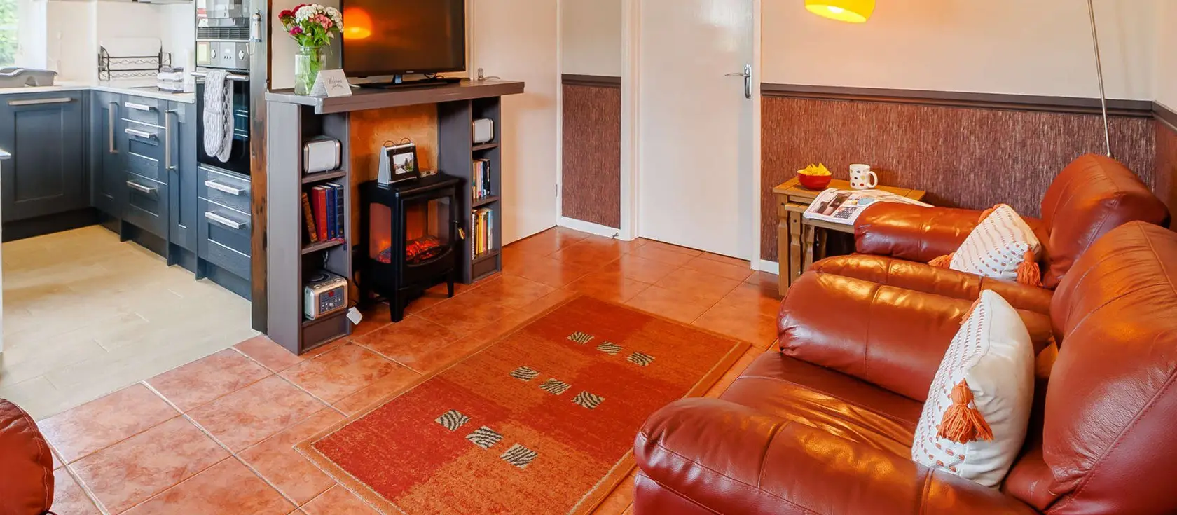 White Cloud Cottage, Brixham is a charming bungalow nestled beside Berry Head Nature Reserve, offering cosy interiors with exposed beams, two bedrooms, & access to coastal trails & harbour attractions. Perfect for families seeking a Devonshire break.