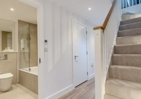 The bathroom & stairs up tot he first floor at White Dunes, Constantine Bay
