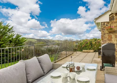 The patio, barbecue & alfresco dining area at Whitestone Farm, Lee