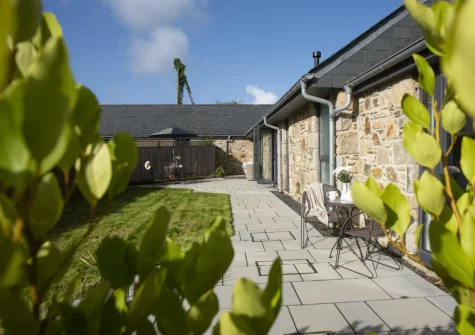 The patio, outdoor sitting area & enlosed garden at Whitewood, Carnhell Green