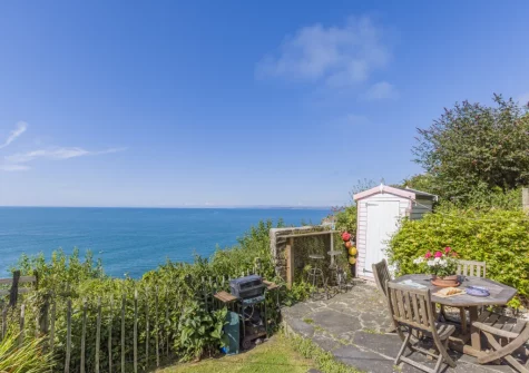 The patio, barbecue, alfresco dining area & garden at Williams Cottage, Buck's Mills
