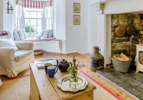 Williams Cottage, Buck's Mills is a charming two-bedroom clifftop retreat with spectacular Atlantic views, featuring a cosy wood burner, peaceful garden with barbecue, and direct access to the South West Coast Path and fascinating beaches below.