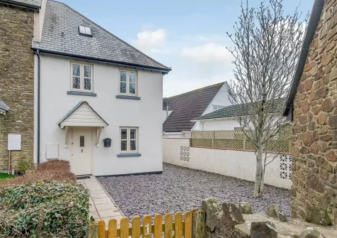 Windward Cottage is a spacious property with private gardens to the front & rear