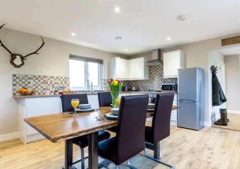 The kitchen & dining area at Windwhistle Lodge, South Molton