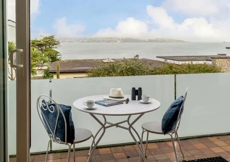 The balcony & outdoor sitting area at Wiston Cap, Brixham