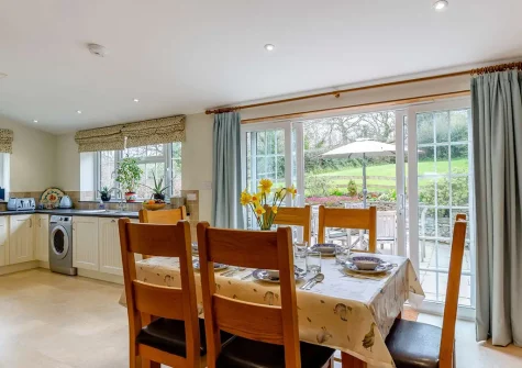 The kitchen & dining area at Withymore Cottage, Malborough