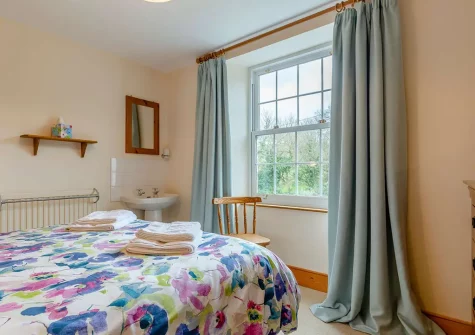 Bedroom #1 at Withymore Cottage, Malborough