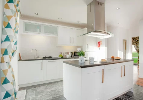 The kitchen at Wonkey Donkey Cottage at Stoneleigh Holiday Village, Weston