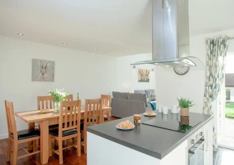 The kitchen & dining area at Wonkey Donkey Cottage at Stoneleigh Holiday Village, Weston