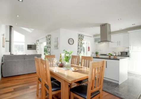 The dining area at Wonkey Donkey Cottage at Stoneleigh Holiday Village, Weston