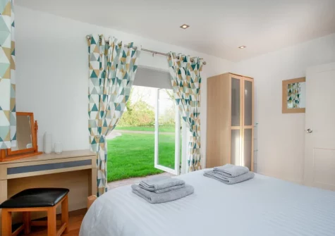 Bedroom #1 at Wonkey Donkey Cottage at Stoneleigh Holiday Village, Weston