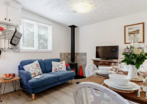 The living area at Woodcutters Cottage at Greatrock Farm, Hennock