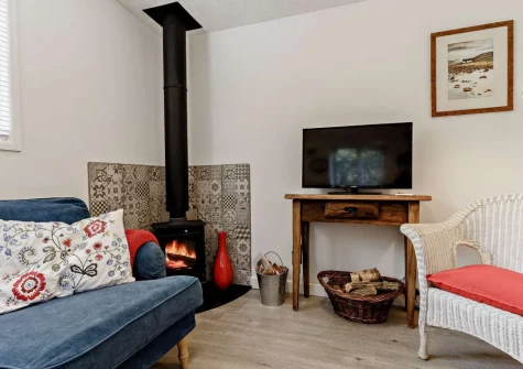 The living area at Woodcutters Cottage at Greatrock Farm, Hennock