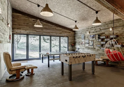The shared games room at Woodcutters Cottage at Greatrock Farm, Hennock