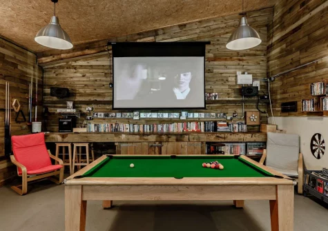 The shared games room at Woodcutters Cottage at Greatrock Farm, Hennock