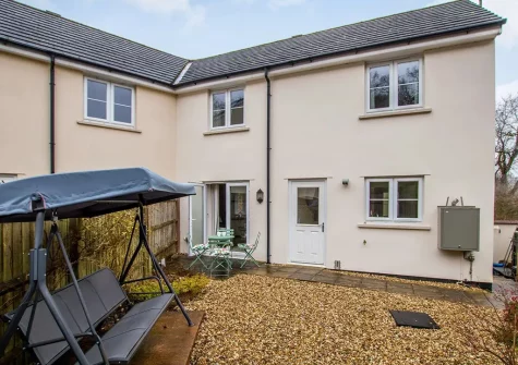 The patio & outdoor sitting area at Woodland Cottage, Bampton