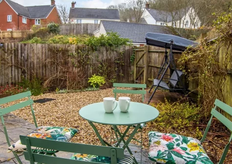 The patio & outdoor sitting area at Woodland Cottage, Bampton