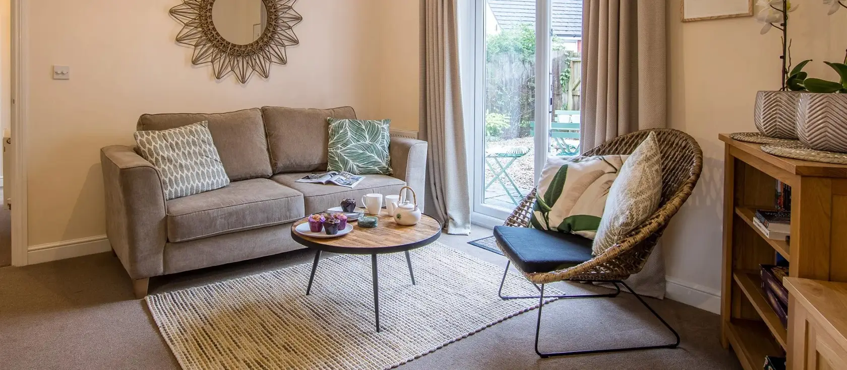 Woodland Cottage, Bampton is a stylish 3-bedroom retreat in historic Devon market town. Enjoy a peaceful enclosed courtyard with stream views, easy access to Exmoor National Park adventures, and charming local shops within walking distance.