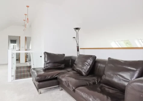 The mezzanine living area at Woodlands Close, Treator