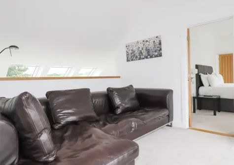 The mezzanine living area at Woodlands Close, Treator