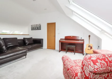 The mezzanine living area at Woodlands Close, Treator