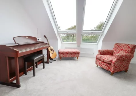 The mezzanine living area at Woodlands Close, Treator