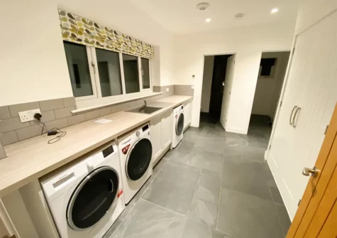 The utility room at Woodlands Close, Treator