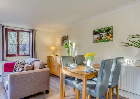 The living & dining area at Woodlands Cottage, Two Waters Foot