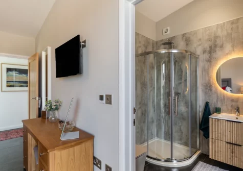 Bedroom #1 & en-suite shower room at Woodside Barn, Hartland