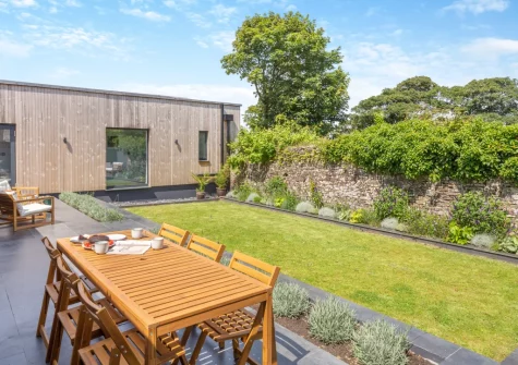 The enclosed courtyard garden at Woodside Barn, Hartland