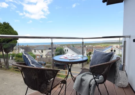The first floor balcony & outdoor sitting area at Woodside, Westward Ho!