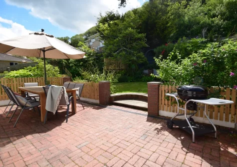 The patio, barbecue & alfresco dining area at Woodside, Westward Ho!