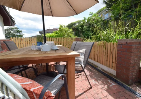 The patio, barbecue & alfresco dining area at Woodside, Westward Ho!