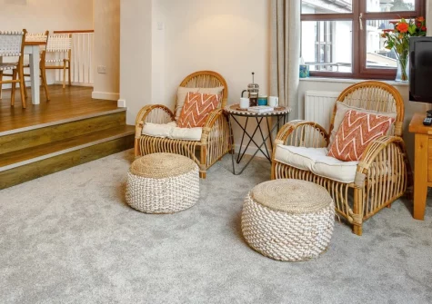 Woodside, Westward Ho! is a fabulous detached coastal home with sea views from many rooms, featuring a private hot tub, games room, and just a short stroll from two miles of beautiful golden sandy beach and the town's shops and restaurants.