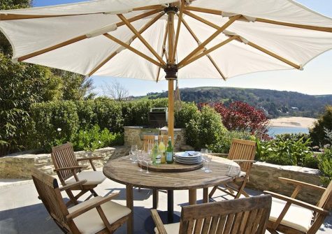 The outdoor patio & barbecue area at Woodwell, Salcombe