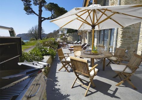 The outdoor patio & barbecue area at Woodwell, Salcombe