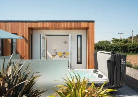 The secluded decked patio & hot tub at Woolacombe Retreat, Hillview, Mullacott