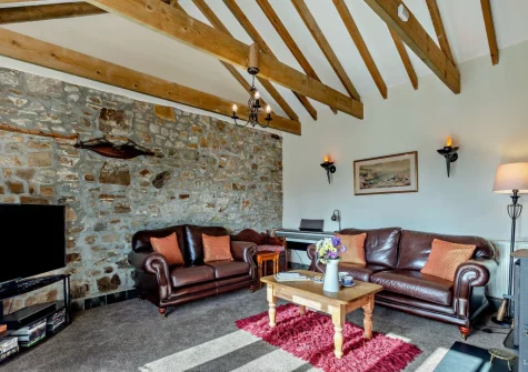 The living room at Woolstone Dunstanvilles Dairy, Box's Shop