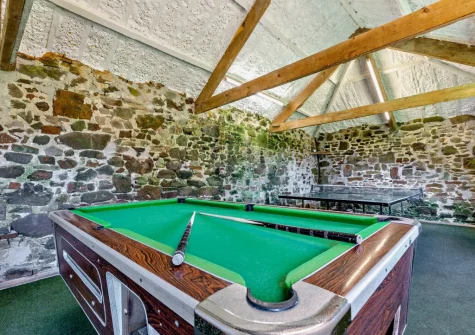 The shared games room at Woolstone Dunstanvilles Dairy, Box's Shop