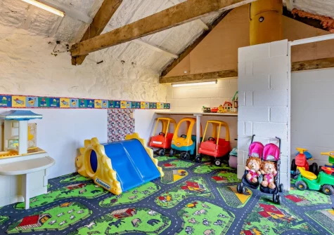 The shared tots play space at Woolstone Dunstanvilles Dairy, Box's Shop