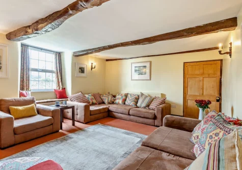 The living room at Woolstone Farmhouse, Box's Shop