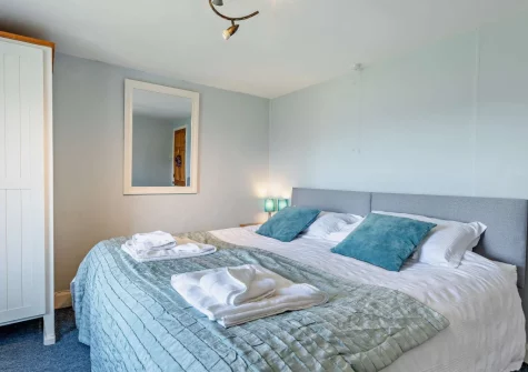 Bedroom #4 at Woolstone Farmhouse, Box's Shop