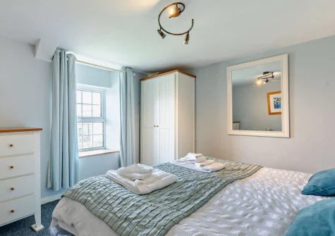 Bedroom #4 at Woolstone Farmhouse, Box's Shop