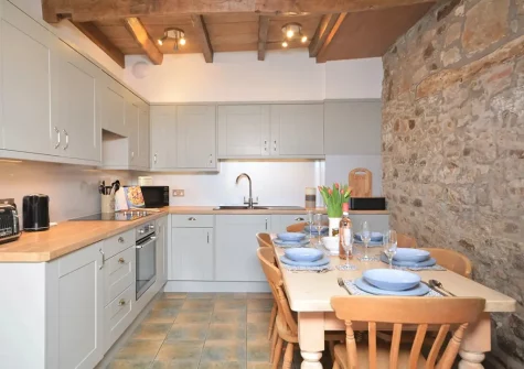 The kitchen & dining area at Woolstone Grenvilles Granary, Box's Shop