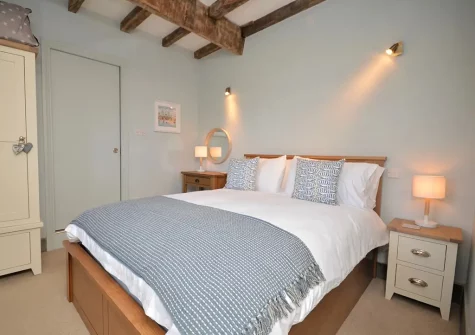 Bedroom #1 at Woolstone Grenvilles Granary, Box's Shop