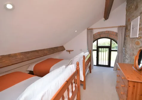 Bedroom #3 at Woolstone Grenvilles Granary, Box's Shop